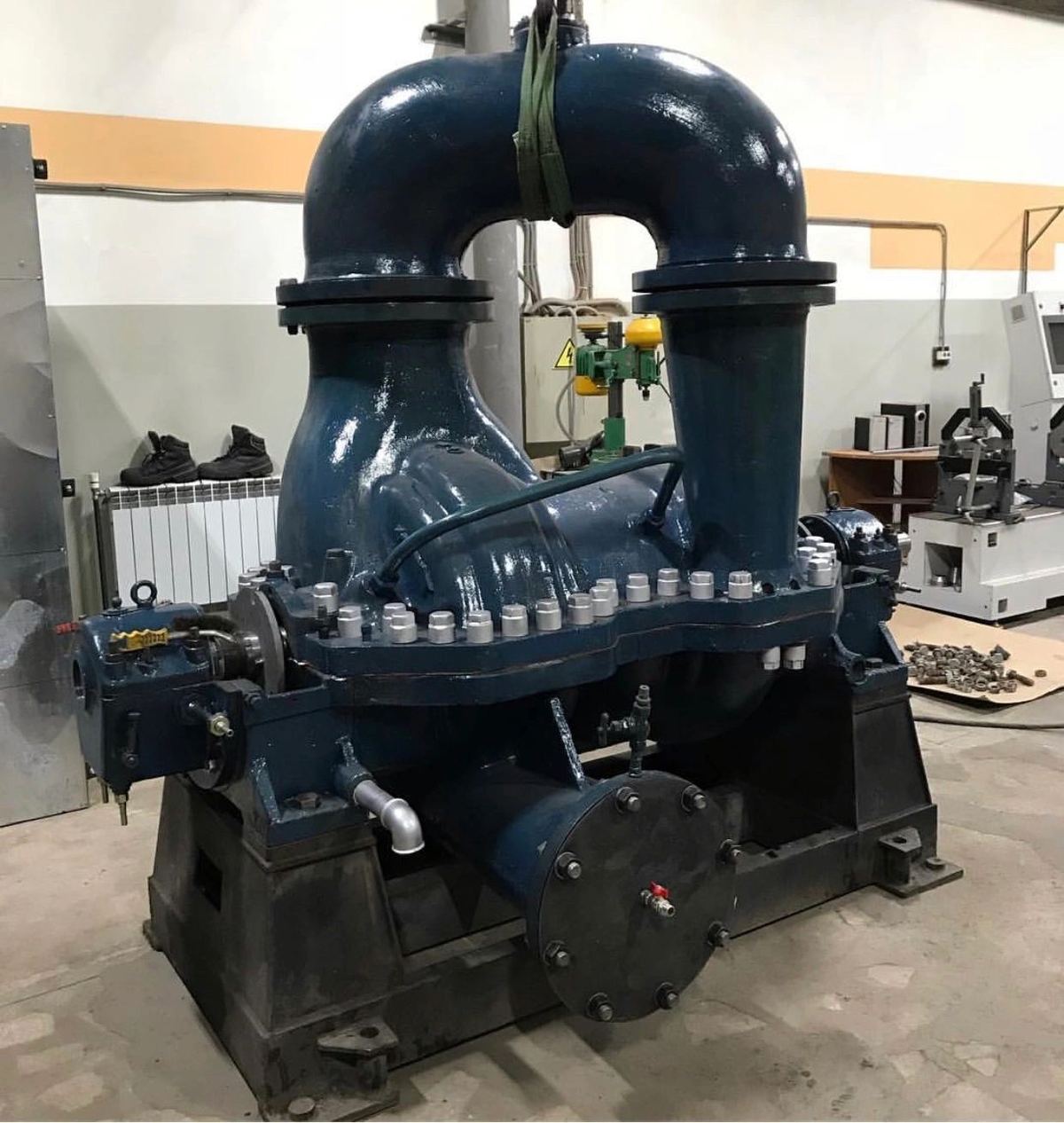 Large split-case industrial pump assembly undergoing repair at the IES Pasadena facility